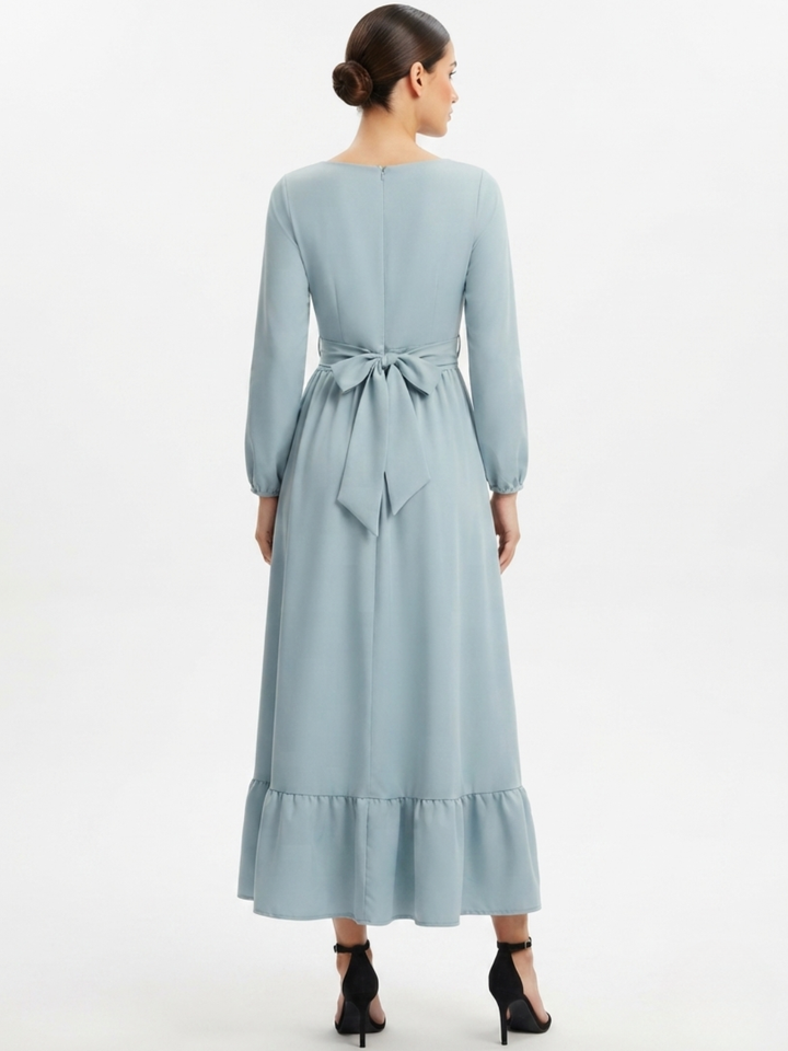 VESTIDO MANGA LARGA CON CUELLO OJAL Y LAZO GIANI CEMENTO