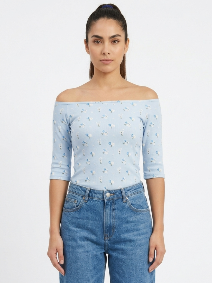 POLO BASICO CUELLO OJAL MAYA CELESTE FLORES