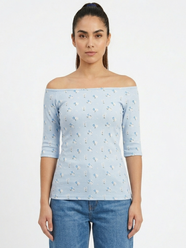 POLO BASICO CUELLO OJAL MAYA CELESTE FLORES