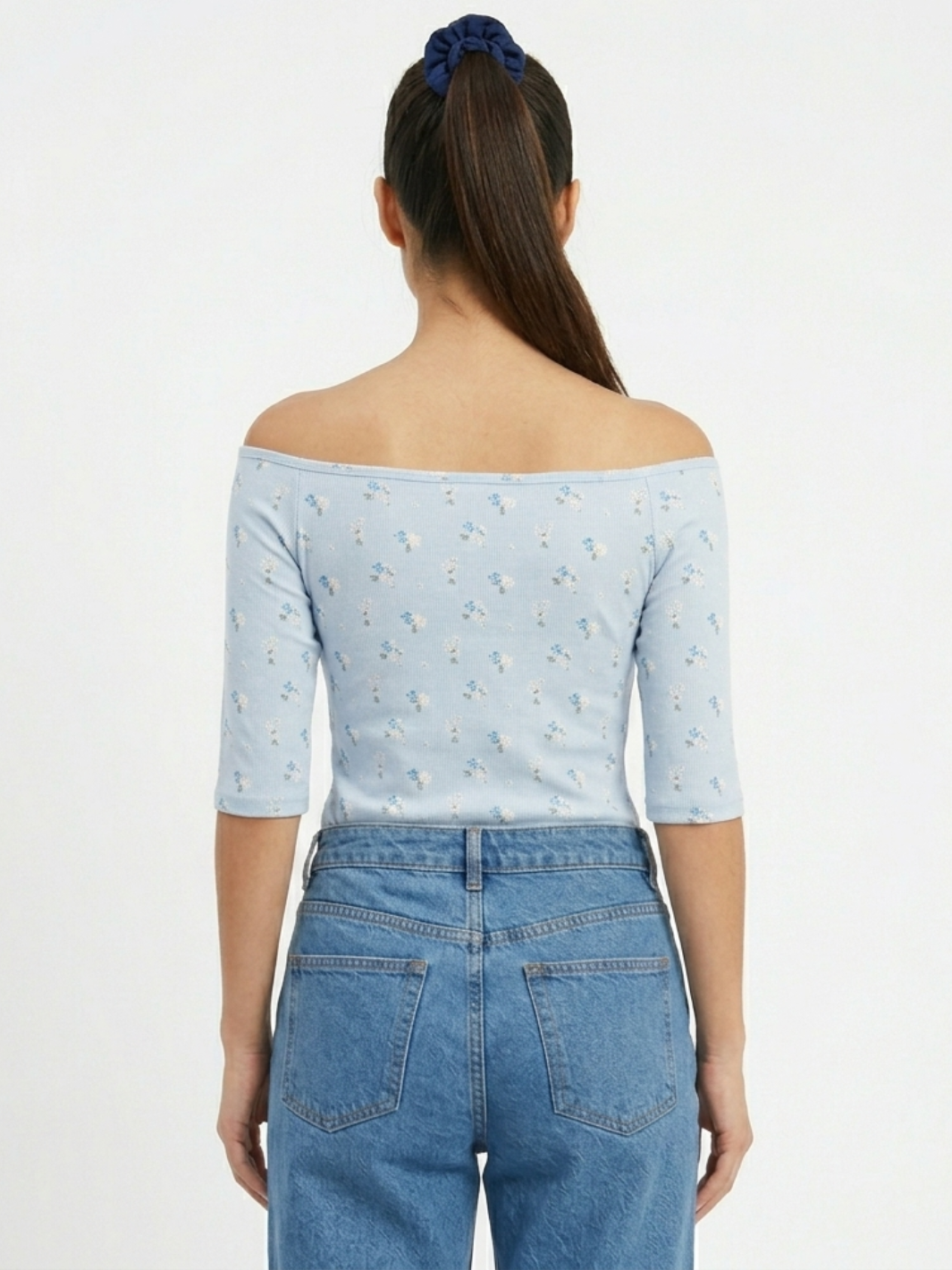 POLO BASICO CUELLO OJAL MAYA CELESTE FLORES