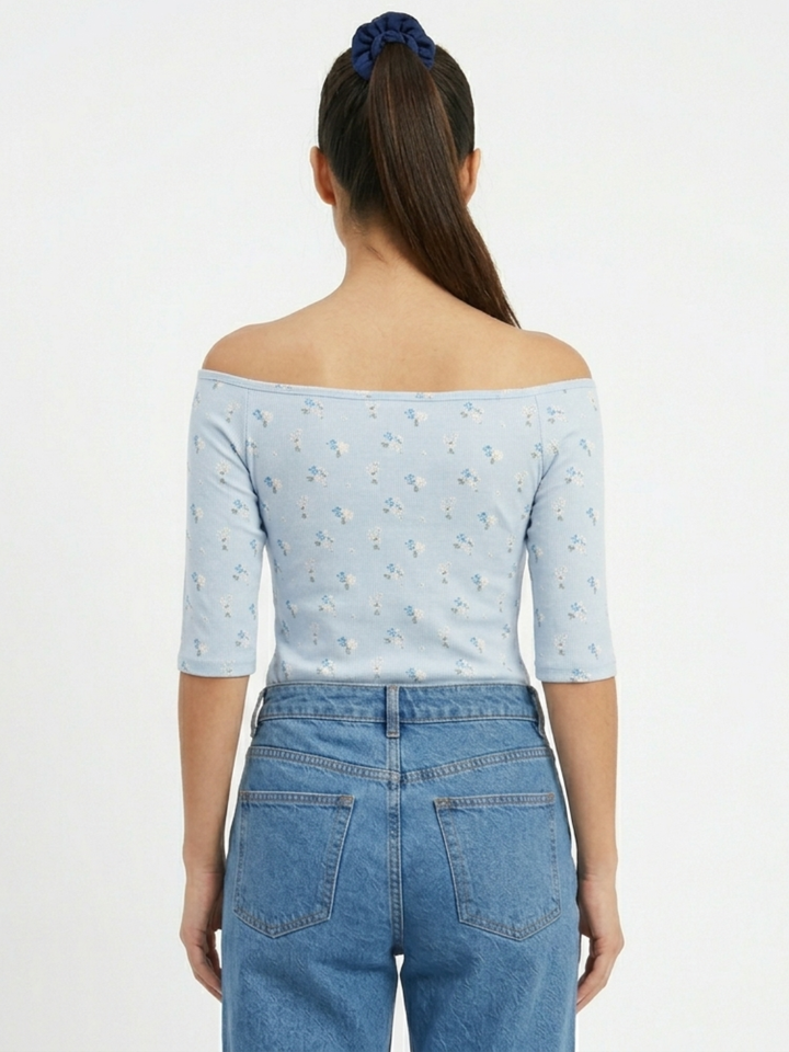POLO BASICO CUELLO OJAL MAYA CELESTE FLORES