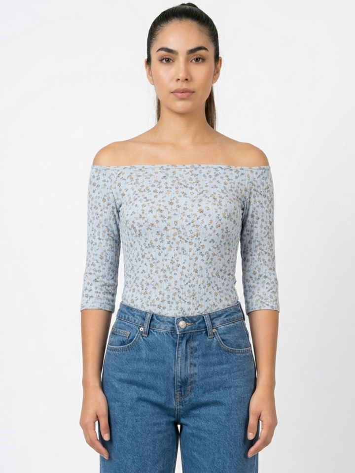 POLO BASICO CUELLO OJAL MAYA CELESTE FLORES/TERRACOTA