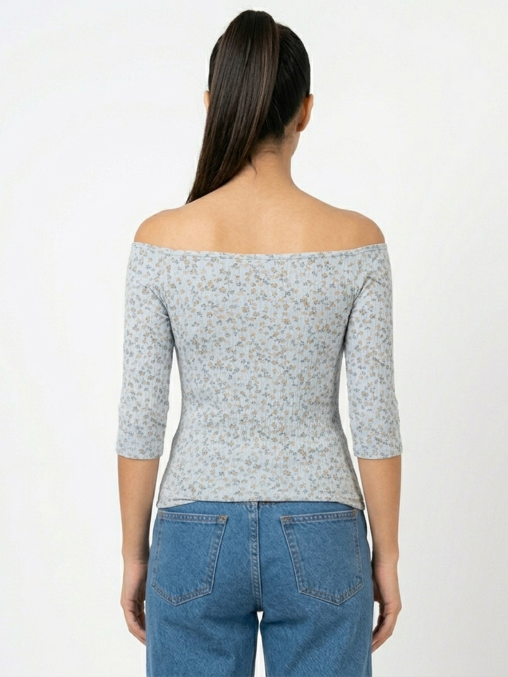 POLO BASICO CUELLO OJAL MAYA CELESTE FLORES/TERRACOTA