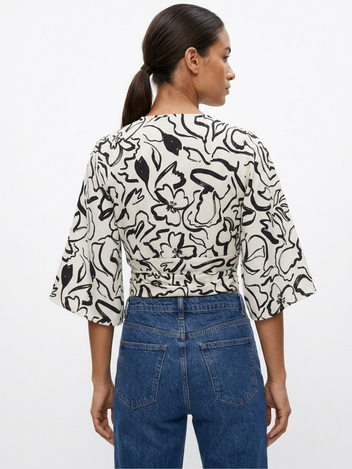 BLUSA ENVOLVENTE GERALDINE PERLA / NEGRO