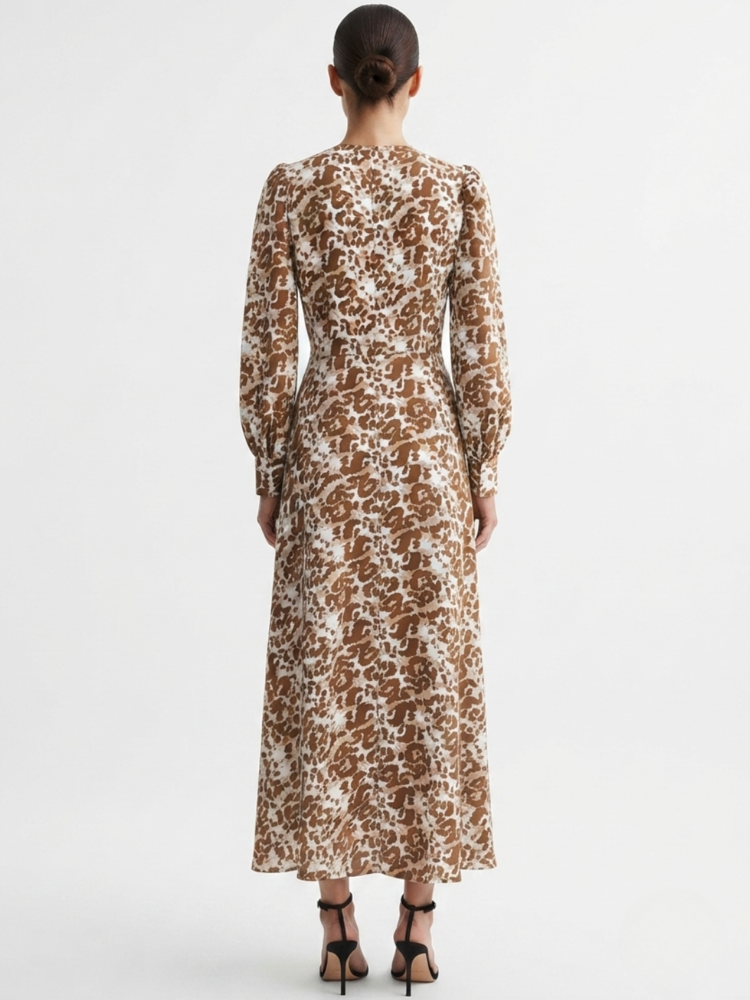 VESTIDO MANGA LARGA CON CUELLO CRUZADO Y CORTE A BARBARA ANIMAL PRINT