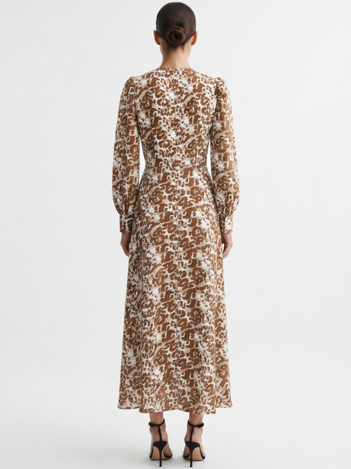 VESTIDO MANGA LARGA CON CUELLO CRUZADO Y CORTE A BARBARA ANIMAL PRINT