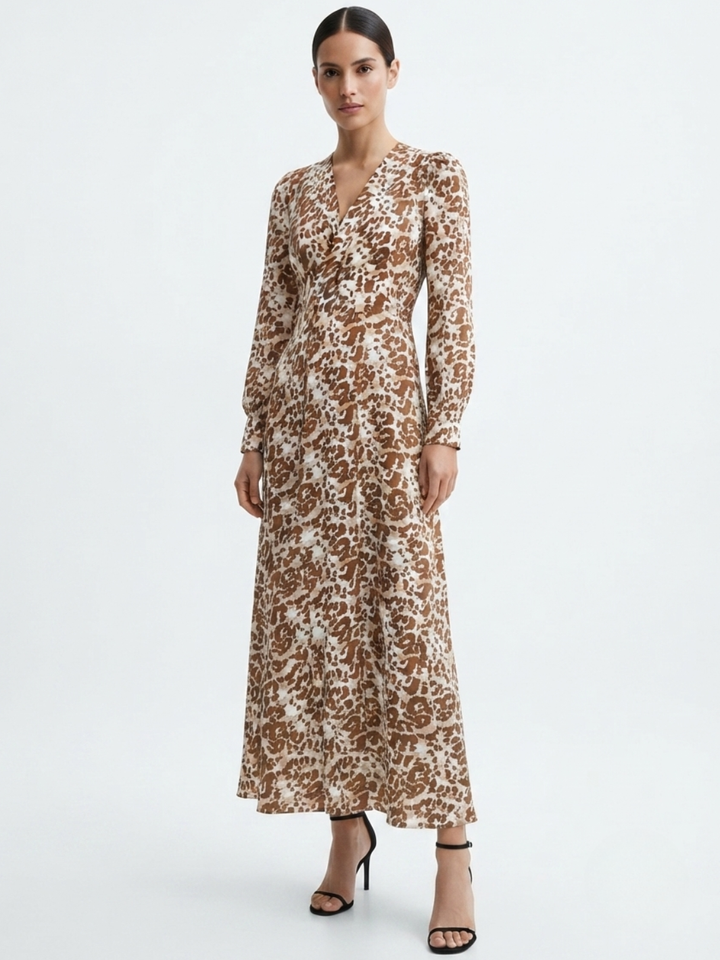 VESTIDO MANGA LARGA CON CUELLO CRUZADO Y CORTE A BARBARA ANIMAL PRINT